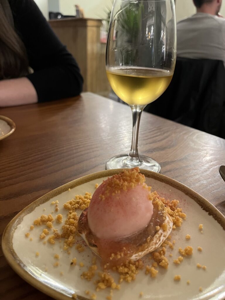 rhubarb sorbet, meringue, crumb, and dessert wine