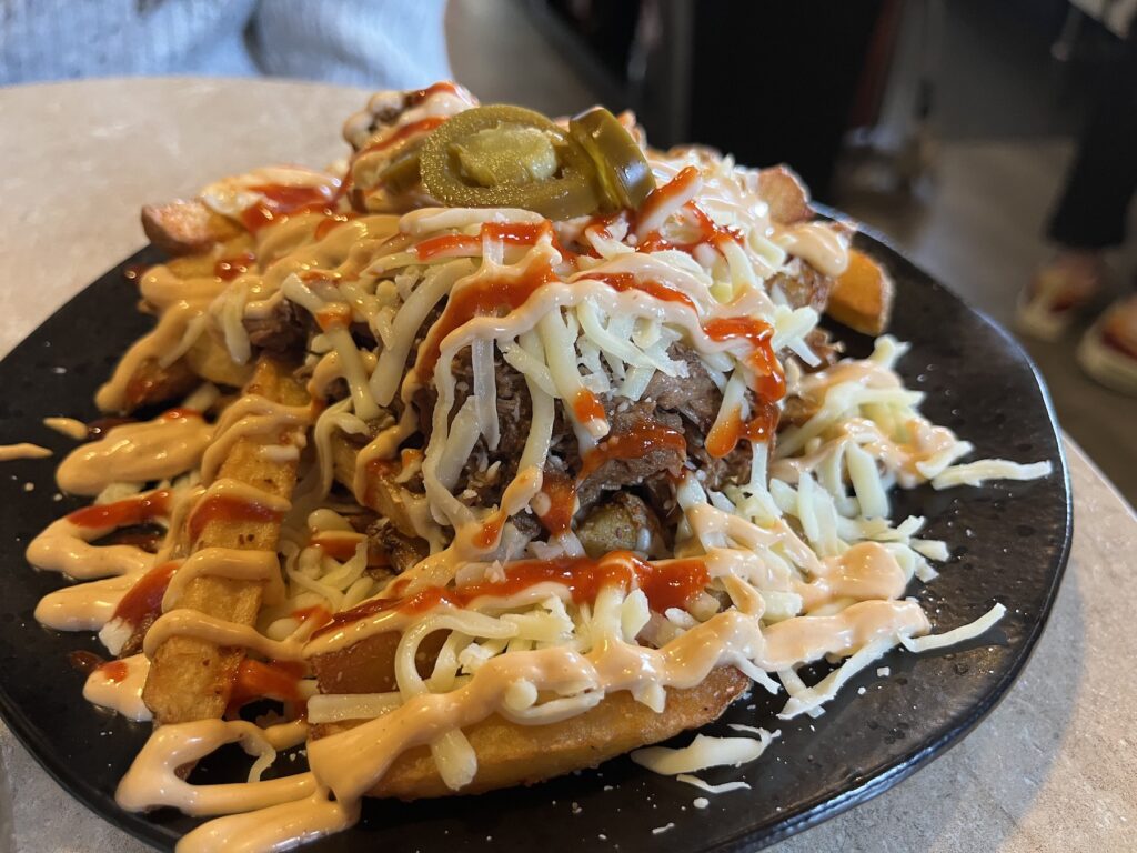 birria meat on fries at birria Bella jesmond